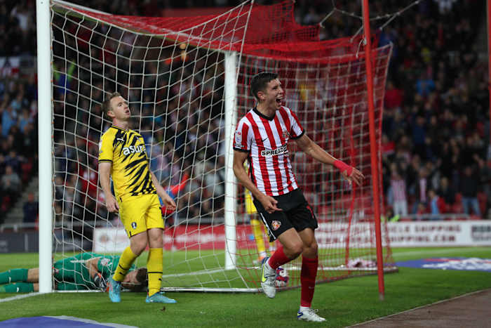 Stewart celebrating his brace against Rotherham earlier this season.
